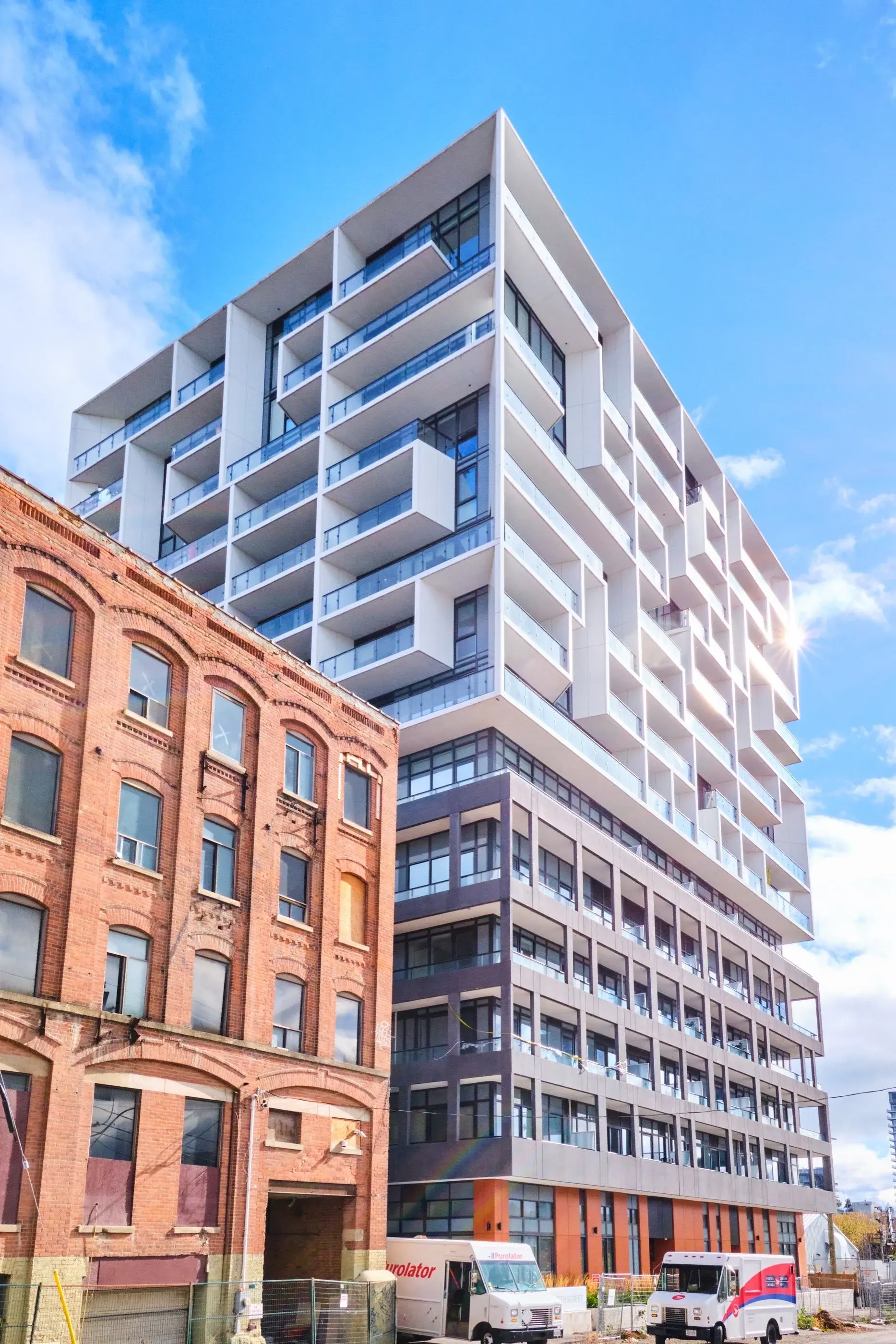 Modern residential tower featuring architectural wall panels